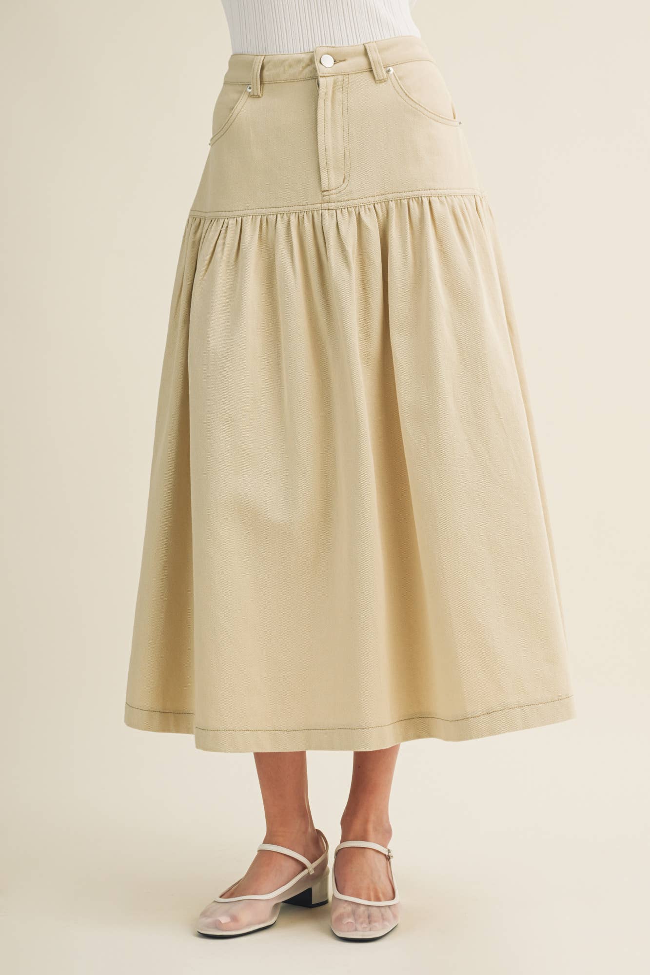 Sculpted Yoke Cascading Volume Skirt Beige
