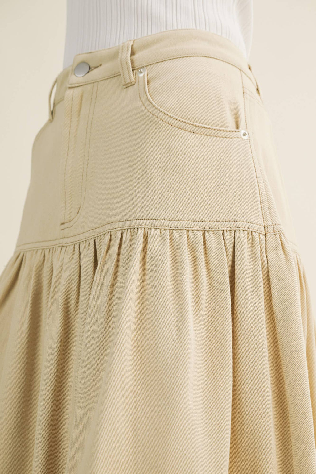 Sculpted Yoke Cascading Volume Skirt Beige