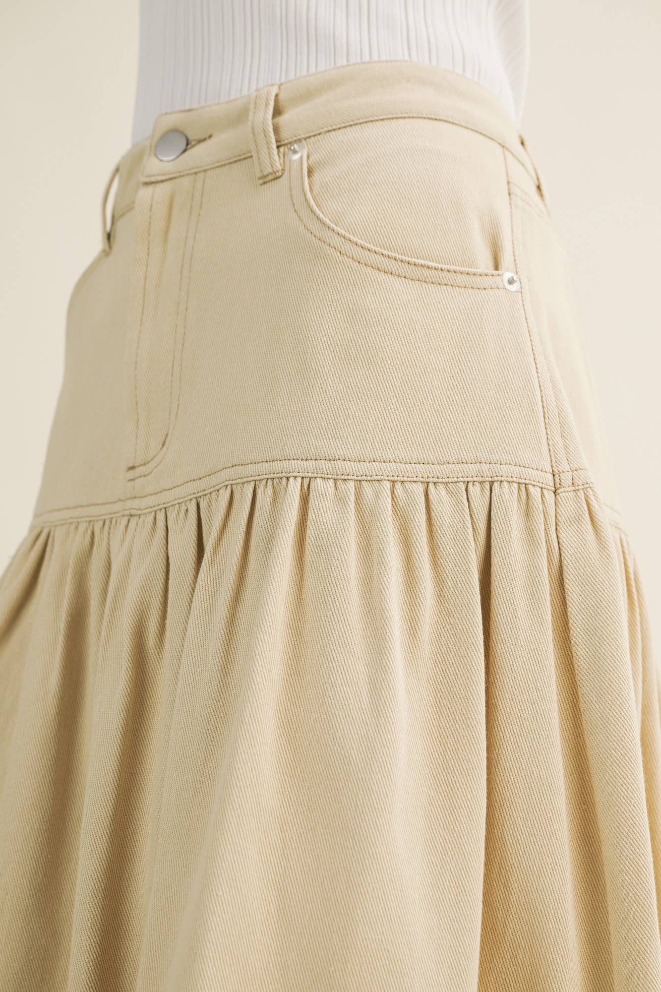 Sculpted Yoke Cascading Volume Skirt Beige